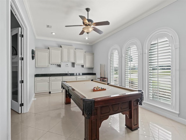 game room with light tile patterned flooring, pool table, ceiling fan, and ornamental molding