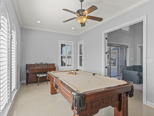 rec room with ornamental molding, a healthy amount of sunlight, pool table, and light tile patterned flooring