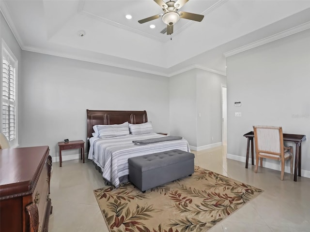 tiled bedroom with ceiling fan, a raised ceiling, and ornamental molding