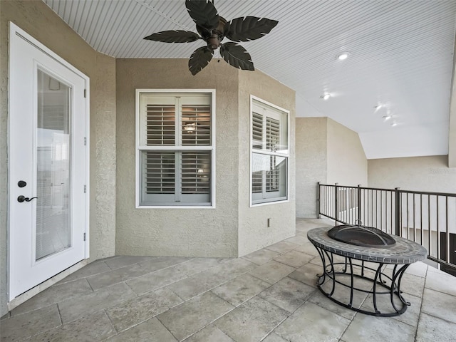 view of patio featuring ceiling fan