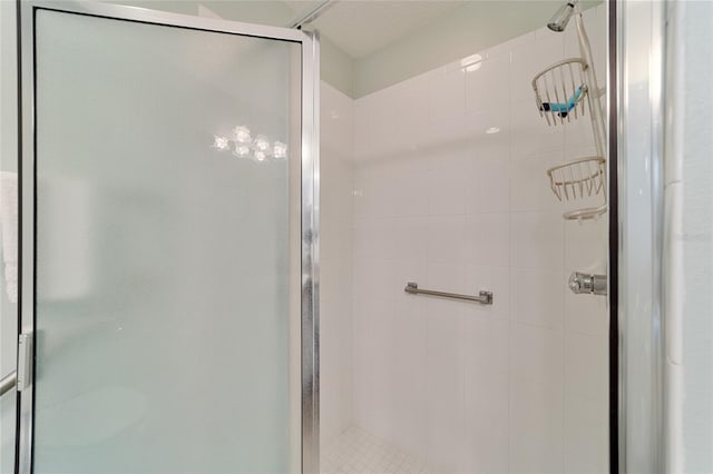 bathroom featuring an enclosed shower