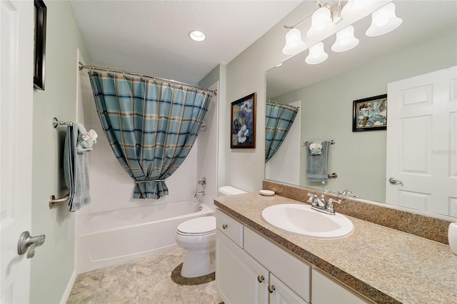 full bathroom featuring toilet, a textured ceiling, vanity, and shower / tub combo with curtain