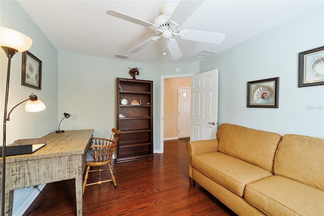 office area with a textured ceiling, ceiling fan, and dark hardwood / wood-style floors