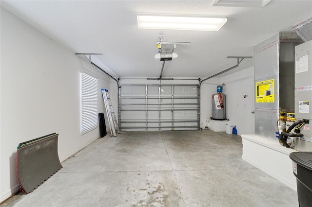 garage featuring electric water heater and a garage door opener