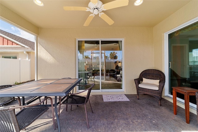 view of patio featuring ceiling fan