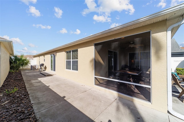 back of property with a patio area