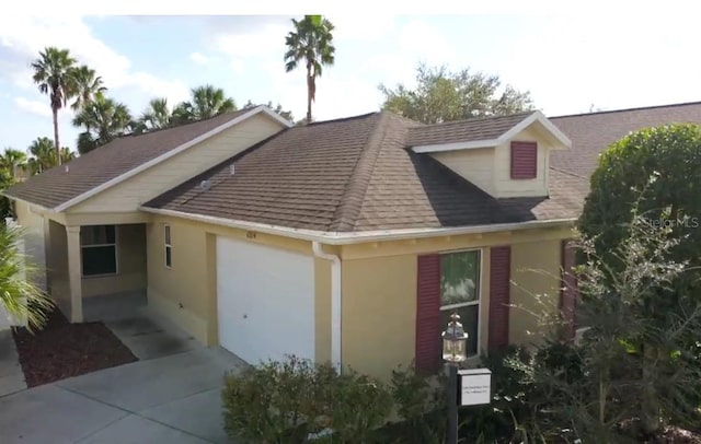 view of front of property with a garage