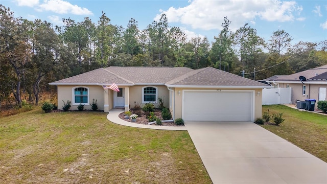 ranch-style house with a front yard and a garage