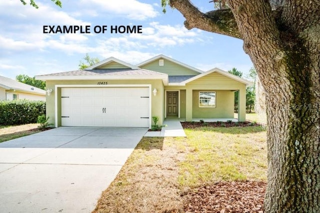 view of front facade featuring a garage and a front lawn