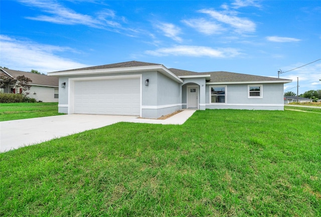 single story home with a front yard and a garage