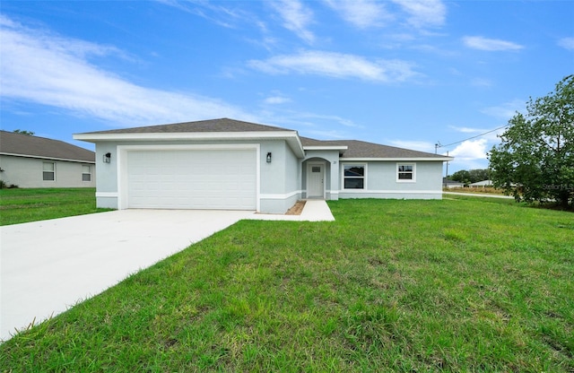 ranch-style house with a garage and a front lawn