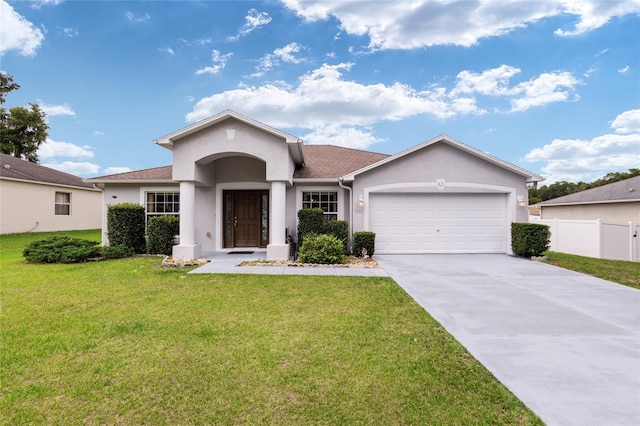 3107 NE 24th Pl, Ocala, FL 34470 - ranch-style home with stucco siding, an attached garage, and concrete driveway