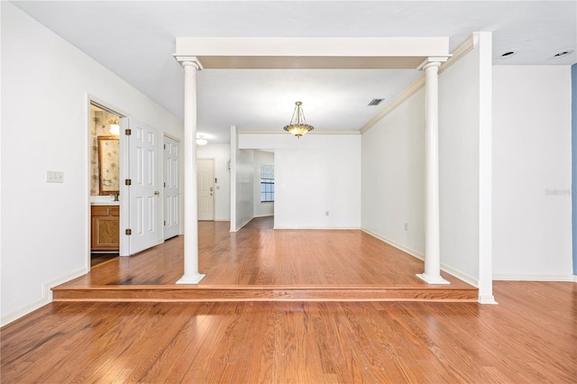 unfurnished room featuring hardwood / wood-style flooring