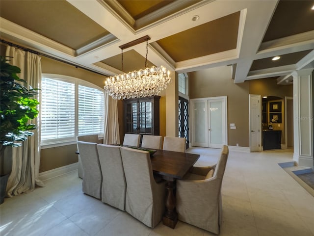 tiled dining space featuring beam ceiling, an inviting chandelier, ornamental molding, and coffered ceiling