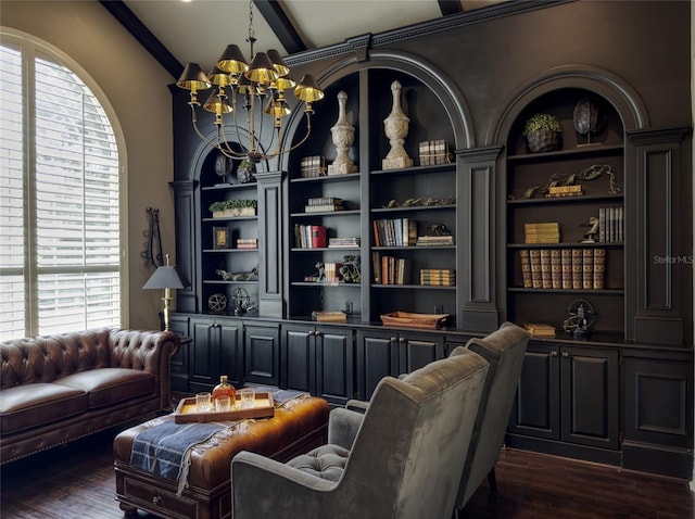 living area with vaulted ceiling with beams, a chandelier, built in shelves, and dark wood-type flooring