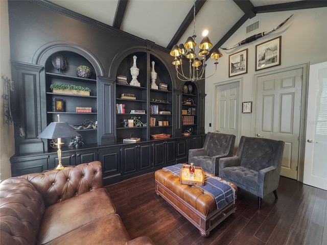 sitting room featuring beamed ceiling, built in features, dark wood-type flooring, and a chandelier