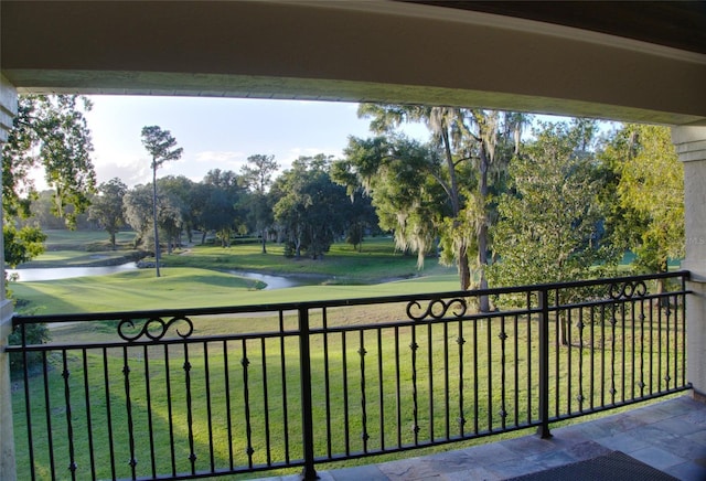 balcony featuring a water view