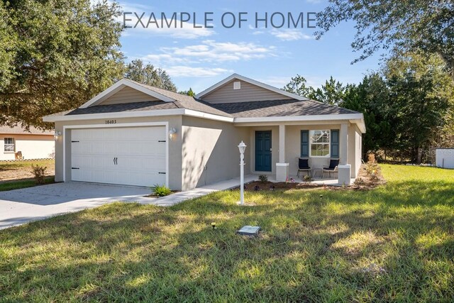 ranch-style house featuring a garage and a front yard