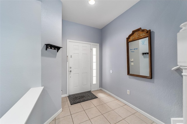 view of tiled foyer entrance