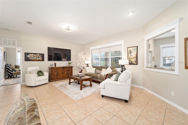 living room featuring light tile patterned floors