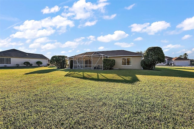 view of yard featuring a lanai