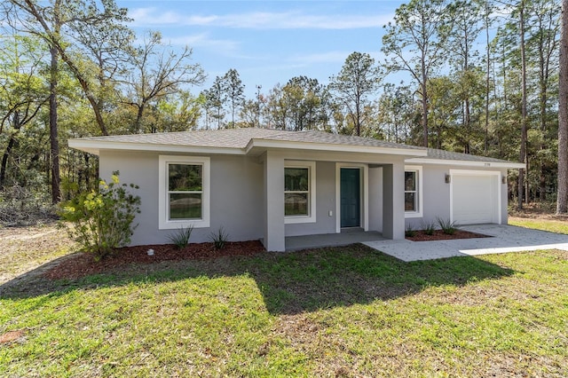 ranch-style home featuring a garage, a shingled roof, a front yard, and stucco siding