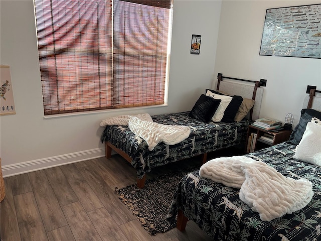 bedroom featuring hardwood / wood-style floors