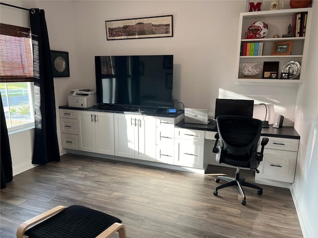 home office featuring light wood-type flooring