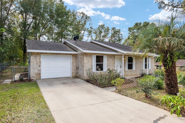 ranch-style house featuring a garage