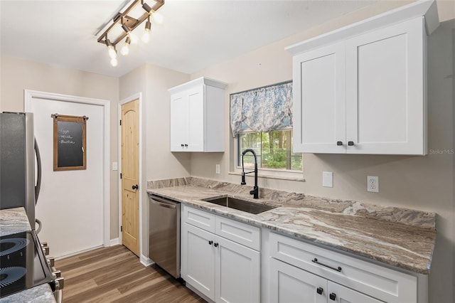 kitchen featuring sink, white cabinets, dark hardwood / wood-style floors, and appliances with stainless steel finishes