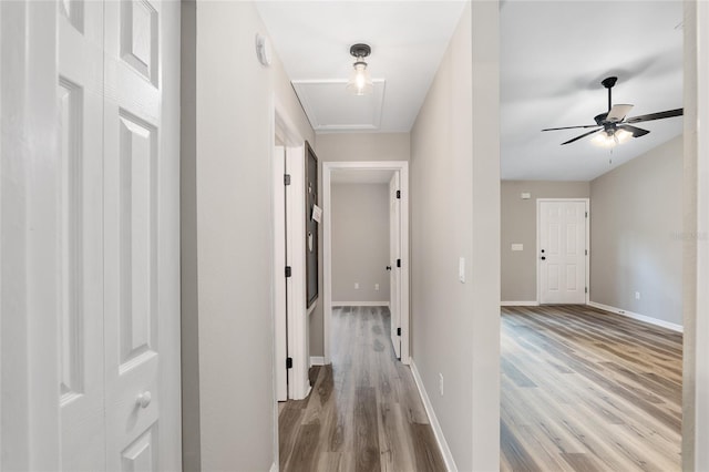 corridor featuring light wood-type flooring