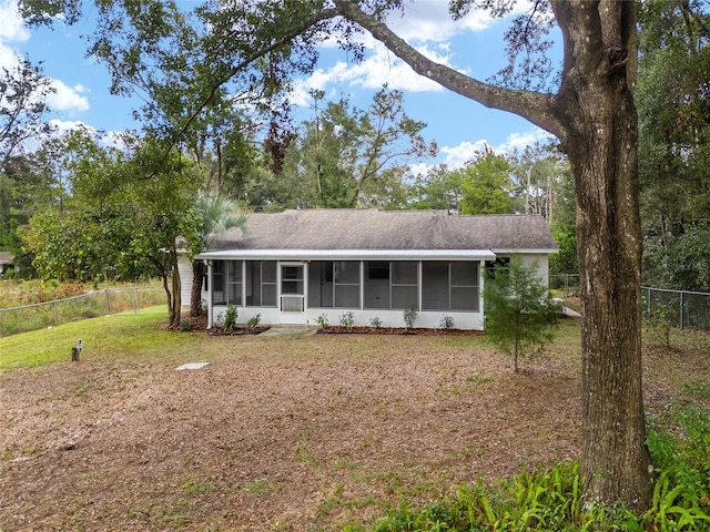 ranch-style home with a sunroom