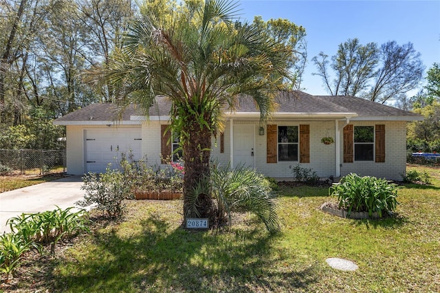 ranch-style house with a garage, brick siding, driveway, and fence