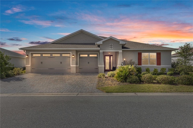 view of front of home with a garage