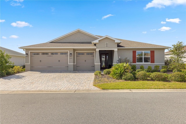 view of front of home with a garage