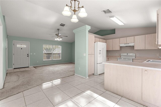 kitchen with light colored carpet, vaulted ceiling, kitchen peninsula, pendant lighting, and white appliances