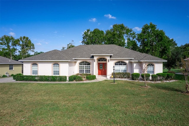 ranch-style house with a front yard