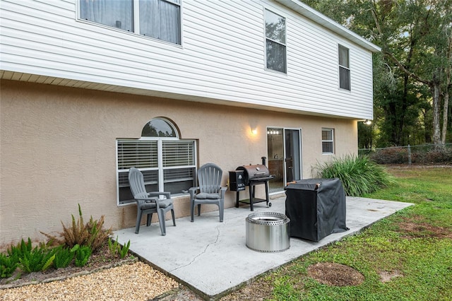 rear view of property featuring a patio