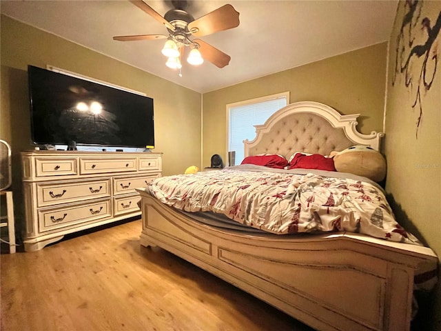 bedroom featuring ceiling fan and light wood-type flooring