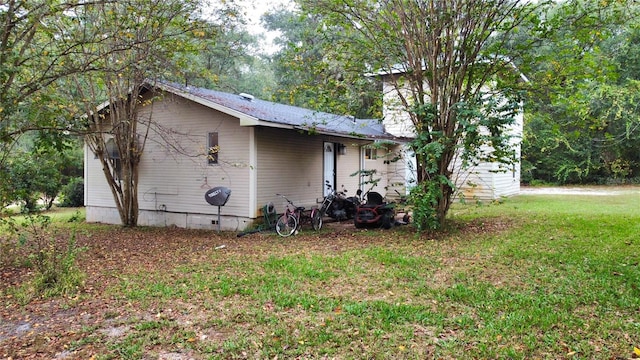 exterior space with a lawn