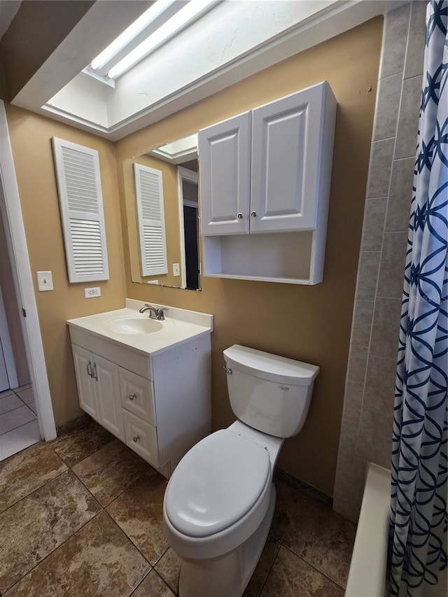 full bathroom with vanity, toilet, and shower / tub combo