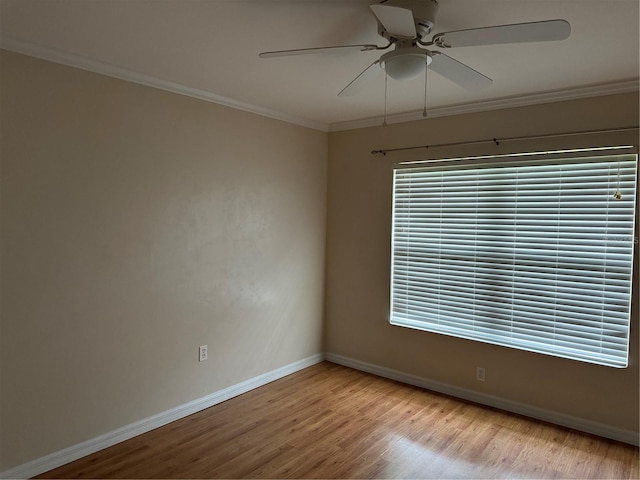 unfurnished room featuring crown molding, ceiling fan, and light hardwood / wood-style floors