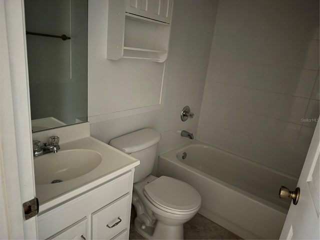 full bathroom featuring vanity, toilet, and tiled shower / bath combo