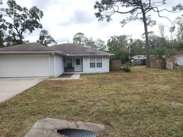 single story home with a front yard and a garage