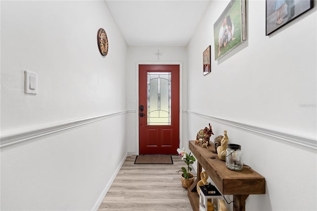 doorway to outside featuring light hardwood / wood-style flooring