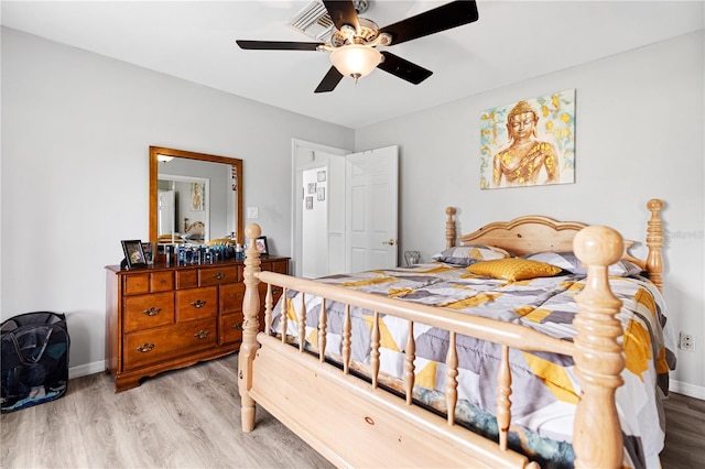 bedroom featuring light hardwood / wood-style flooring and ceiling fan