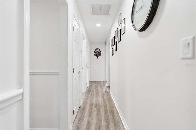 hallway featuring light hardwood / wood-style floors