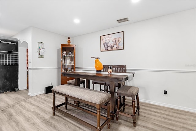 dining area with light wood-type flooring