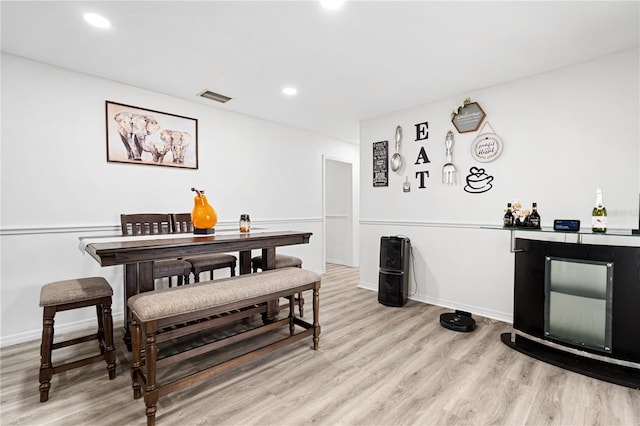 dining room featuring light hardwood / wood-style floors