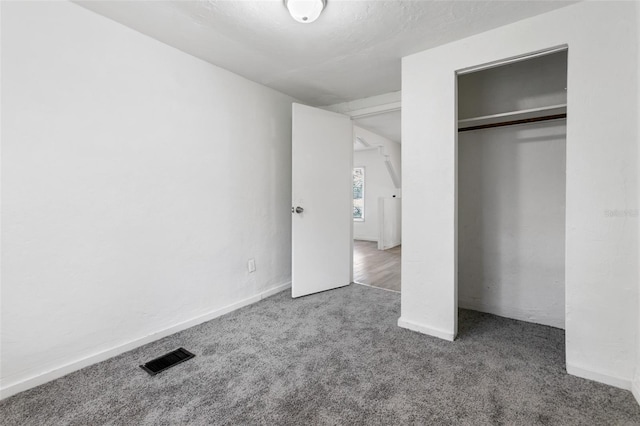 unfurnished bedroom featuring carpet floors